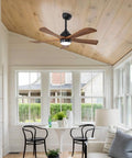 Geelife 42" 5PCS Solid Wood Blades Ceiling Fan with Lights Remote Control in a bright sunroom with a wooden ceiling.