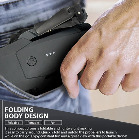 Person putting a foldable 4K Camera Drone For Kids And Adults, Foldable Silent Quadcopter into pocket, highlighting portability.