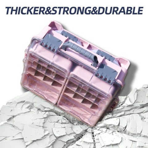 Universal Fishing Tackle Box With Two Small Tackle Trays And Removable Inside Compartments on cracked surface