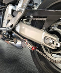 Motorcycle Chain Slack Adjuster Tool For Easy Quick And Precise Chain Slack Adjustment with Real Time Tension Indicator in use