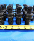 Shop Bench Essential Featuring Cat50 Coolant Through Retention Knobs and Pull Studs Built for Quick Swap Actions on your Heavy Duty CNC Milling Rig with 1 Inch 8 Dead Nuts Tight Fit, close-up of black retention knobs.