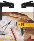 Rock Solid 3/4 Inch MFT Bench Holdfast Woodworking Clamp Aluminum Alloy on workspace with tools and wood shavings.