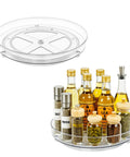 Two Pack Nine Inch Clear Acrylic Lazy Susan Turntable Spinner With Non Slip Base For Kitchen Pantry Cabinet Fridge And Makeup Tray That Is A Straight Up Game Changer For Decluttering Your Home Hella Sturdy with oils and spices.