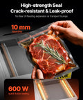 VEVOR chamber vacuum sealer in a kitchen; hand seals a meat bag with 10 mm seal strip and rosemary