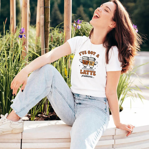 Woman wearing 'I've got a latte problem' t-shirt, featuring the Funny Coffee Iron On Transfers Set With 24 Sheets Ready To Press DTF Patches