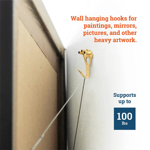 100 Lb Picture Hanging Hooks Set Heavy Duty Picture Hangers with wire attached to wall-mounted frame corner.