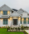 Outdoor Wall Lantern Waterproof Exterior Light Fixture With Clear Glass Shade For Front Porch And Door Modern Farmhouse Style Sconce In Oil Rubbed Bronze That Delivers Classic Look And Weatherproof Durability Built To Last on a modern house facade