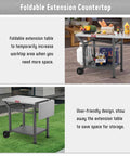 Movable Grill Table With Folding Side Table And Pizza Oven Prep Cart For Outdoor And Indoor Use, Stainless Steel 43 Inch Tabletop With Undershelf, Six Utensil Hooks, Gas Cylinder Hook, Easy Foldable Extension, Grey showcasing foldable extension and storage features.