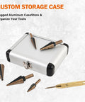 Six Piece Step Drill Bit Set With Automatic Center Punch Titanium HSS Coated Unibits Fifty Sizes For Metal And Aluminum Includes Durable Aluminum Case High Speed Cutting For DIYers visible with aluminum storage case and drill bits.