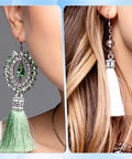 Close-up of earrings with green gemstones and white tassels, featuring 100 Pcs Cord End Caps Jewelry Making Kit With Five Styles In Antique Silver Alloy Tips Plus Lobster Clasps And Jump Rings For DIY Bracelets Necklaces And Anklets Create Custom Bling With Ease elements.