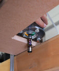 Dead Nuts Perfect Single Grip Router Base Plate For Milwaukee M18 Fuel Compact Router 2723 20 mounted above a wooden work surface.