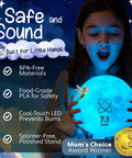 Child holding 3D Moon Night Light For Kids Bedroom With Color Changing LED Globe Night Light Touch And Remote Control Dimmable Brightness Timer