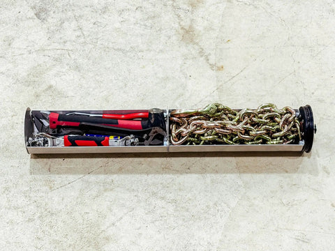 Space Saving Hidden Torque Tube Tool Tray Organizer for Front End Loader Tractor filled with tools and chains