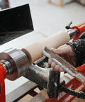 Close-up of a wood lathe in use with a multitooth drive center for wood turning, featuring a two-pack of drive centers shown installed.