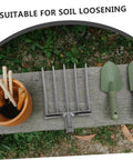 Heavy Duty Steel Farm Fork With Four And Five Prongs for soil loosening and turning on wooden bench.