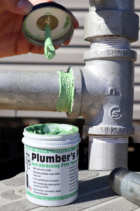 Nonhardening PTFE Thread Sealant Paste For Sealing Worn Metal And Plastic Pipe Threads With Tough As Nails Performance Under High Temp And High Pressure Up To 10000 PSI In A 5 Oz Brush Top Can Made In USA applied on pipe