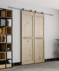 10 Foot Brushed Stainless Steel Double Sliding Barn Door Hardware Kit With Soft Close Top Mount Rollers For Indoor Bi Parting Track Fits Doors From One And Three Eighths Inches To One And Three Quarters Inches installed on wooden doors in living room.