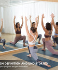 Women practicing yoga in front of Wall Mounted Full Length Gym Mirror Set, 3-Piece 48 By 24 Inch Frameless Glass Body Mirror.