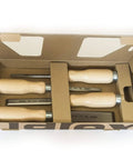 Killer 4 Piece Chisel Set Featuring Legit Cr Mn Steel Blades And Slick Lacquered Wood Handles Pre Sharpened in cardboard packaging.