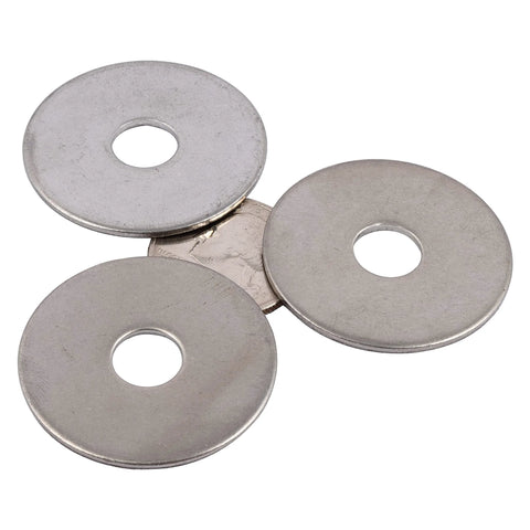 Stainless steel fender washers, top-down view, 1-1/4 in outer diameter with 3/8 in center hole, four shown.