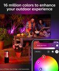 Couple enjoying patio with Econic Up Outdoor Smart Wall Light Black With E26 Base Color Ambiance, app controlling light colors