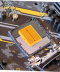 Close-up of a yellow breadboard on a circuit board, showcasing the Plug And Play Solderless Breadboard Kit With Six Compact Yellow Protoboard Panels For Rapid Circuit Assembly And Hassle Free Electronics Crafting For Tech Students And Weekend Builders.