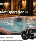 Top Shelf 1.5 Horsepower Hot Tub Spa Pump with Nema 48 frame motor next to quiet spa with smooth water surface.