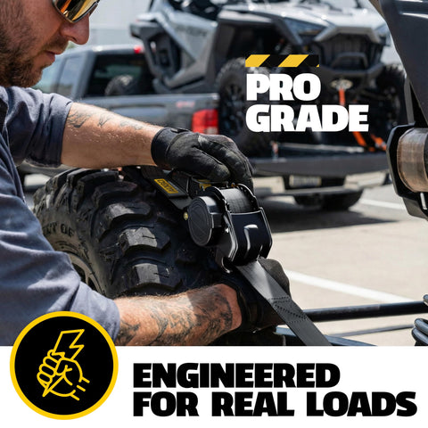 Close-up of a person using Heavy Duty Retractable Ratchet Straps 4 Pack With Soft Loops And Storage Bag Self Retracting Tie Down Straps
