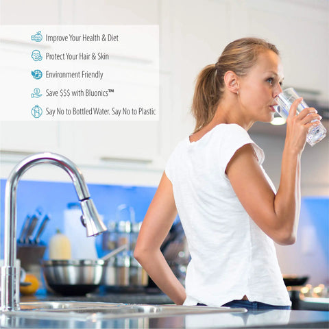 Woman enjoying crisp pure water from Solid Five Stage Under Sink Reverse Osmosis Drinking Water Filter System With Nsf Certified Membrane.