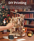 3D Puzzle Kit For Adults Wooden Printing Press Model Building Kit With 303 Pieces, DIY Wood Craft, STEM Hobby Toy, Includes Illustrated Manual, Screwdriver, Spring, And Custom Rubber Stamp Set For Creative Hands On Fun. Wooden printing press model in use
