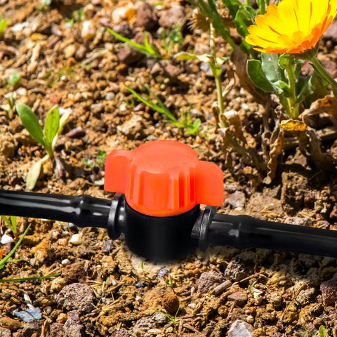 20 Pack One Quarter Inch Drip Irrigation Valve Fittings With In Line Shut Off Valves Barbed Connectors installed in garden