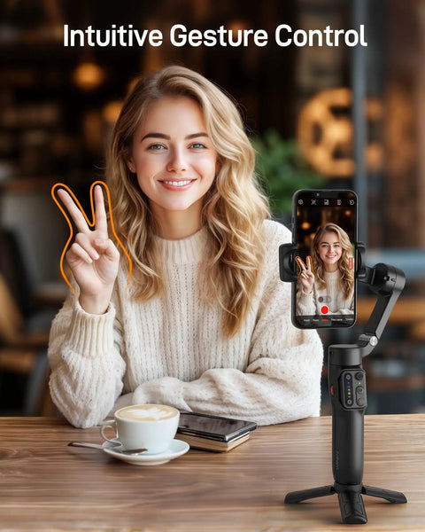 Woman using Compact 3 Axis Phone Gimbal With Detachable Magnetic Remote, Foldable Travel Stabilizer For iPhone And Android indoors.