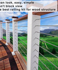 Deck Cable Railing Kit With Right And Left Handed Swage Lag Screws For Wood Posts One Eighth Inch Stainless Steel T316 Marine Grade Rustproof DIY Baluster Rail Hardware Wrench Included installed on wooden deck with green landscape view.