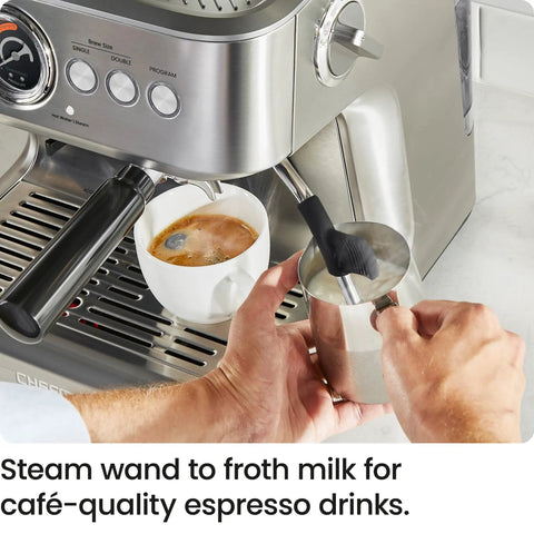 Next Level No Sweat Home Espresso Machine Built Around Conical Burr Grinder Barista Steam Frother frothing milk with steam wand.