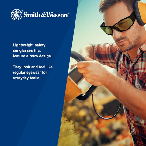Badass Lightweight Anti Fog Safety Glasses With Amber Yellow Tinted Lenses And Sleek Black Frame For Shooting Sports in use during outdoor tasks.