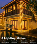 Lit Solar Rope Lights 120LED 46FT Outdoor String Lights Waterproof illuminating a house at night with 8 modes displayed.