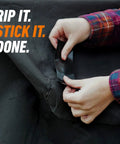 Hands applying All Weather Duct Tape For Outdoor Repairs Black 1.88 In By 25 Yd Heavy Duty Waterproof Tape on fabric.