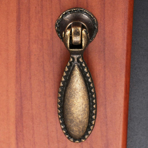 Two Pack Antique Bronze Single Hole Handle Pulls For Wooden Furniture Cabinets 60x18mm installed on wood surface