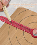 User marking a circle with Pro Shop Quality Woodworking Compass Scriber on wooden board for precise measurements.