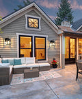 Heavy Duty Outdoor Wall Lanterns Waterproof Exterior Sconces With Beveled Glass on a cozy porch with furniture and potted plants.