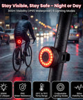 Night riding with Real Time Bike GPS Tracker Tail Light with Apple Find My Compatibility, showing IP65 waterproof and lighting modes.