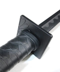 Close-up of durable lightweight polypropylene ninja sword for ninjutsu practice and sparring, black 34.5 inch training blade handle detail