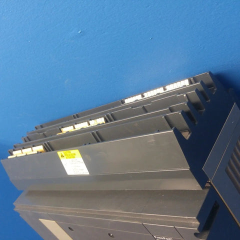 Subfeed Lug Kit For Circuit Breaker S33930, heavy duty electrical lug kit shown from side angle against blue background