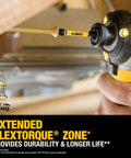 DEWALT screwdriver bit installed in an impact driver chuck; yellow and black drill with a gold hex bit (side view)