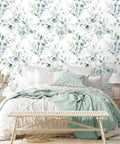 Peel And Stick Boho Wallpaper Green White Botanical Leaf Floral Wall Mural Vibe behind bed with green blanket