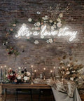 It's A Love Story Personalized Neon Light Sign For Bedroom And Wedding Decor Large 23.6 Inch LED Neon Sign on floral display