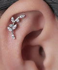 Implant Grade Titanium Screw Back Studs For Sensitive Ears Built Tough And Looking Sick With Zero Allergies Making Them A Straight Up Game Changer For Daily Grind on earlobe with a floral design.