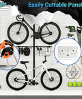 Dang Tough Four By Eight Slatwall Panel Kit With Quick Snap Lock Pvc Garage Wall Organizer And Rock Solid Extra Durable Waterproof Workshop Storage System mounted with bikes and tools.