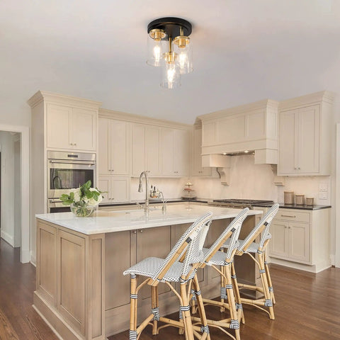 Three-Light Semi Flush Mount Ceiling Light Fixture With Dope Clear Glass Cylinder Shades In Gold Finish in modern kitchen