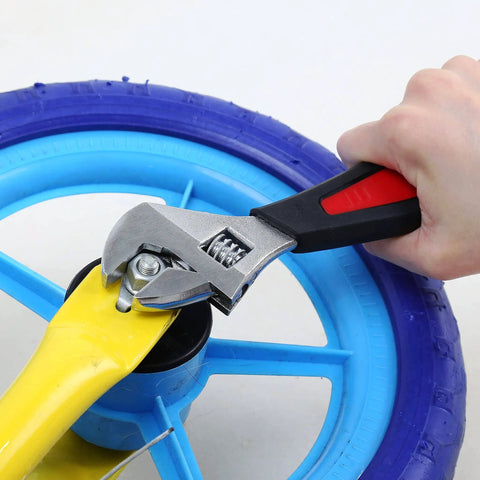 Close-up of hand using wrench from 149-Piece Home And Auto Tool Kit With Hammer, Ratchets, Sockets, Pliers, Hex Keys And Durable Case